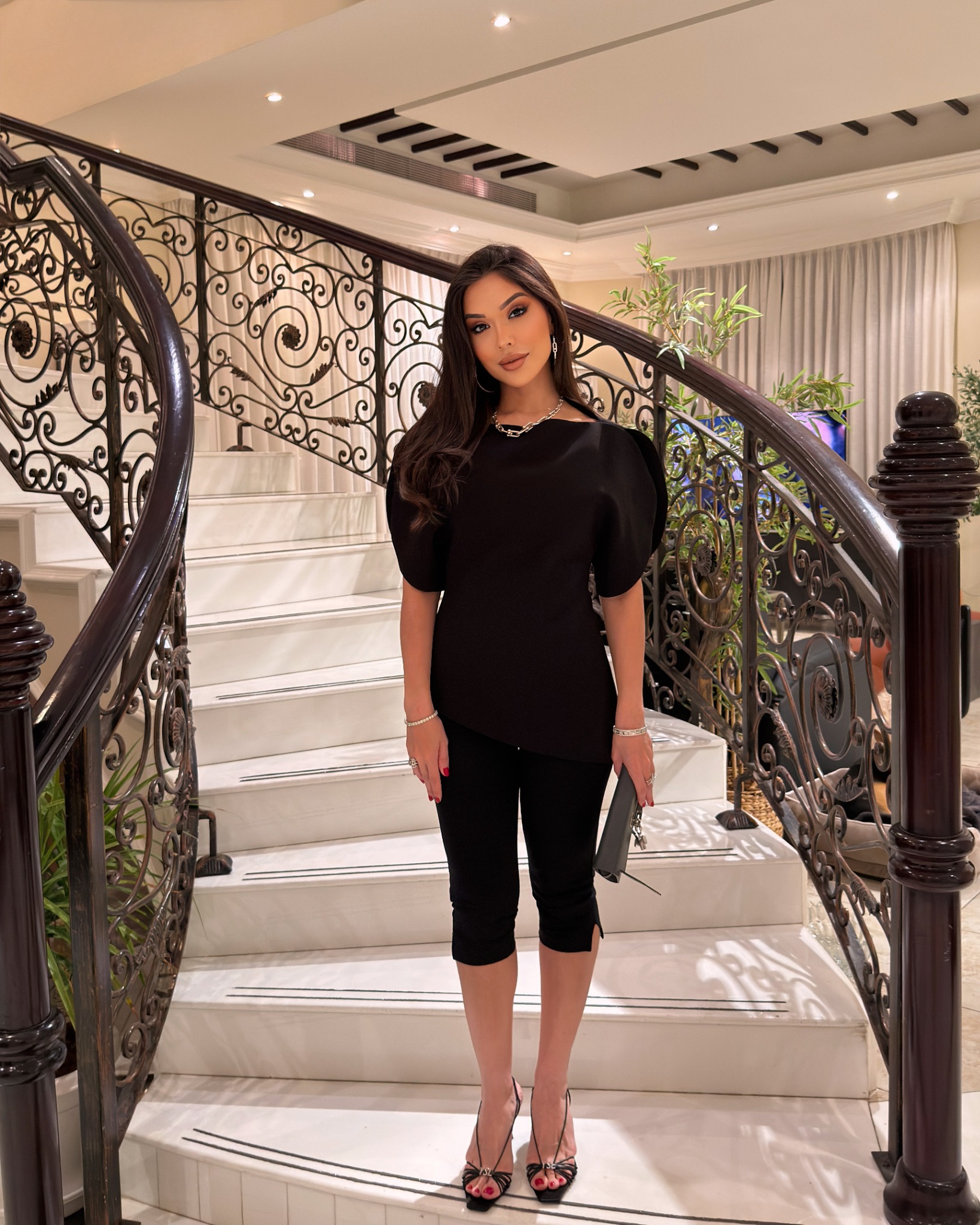 Organic fashion collaboration featuring a sculptural black look