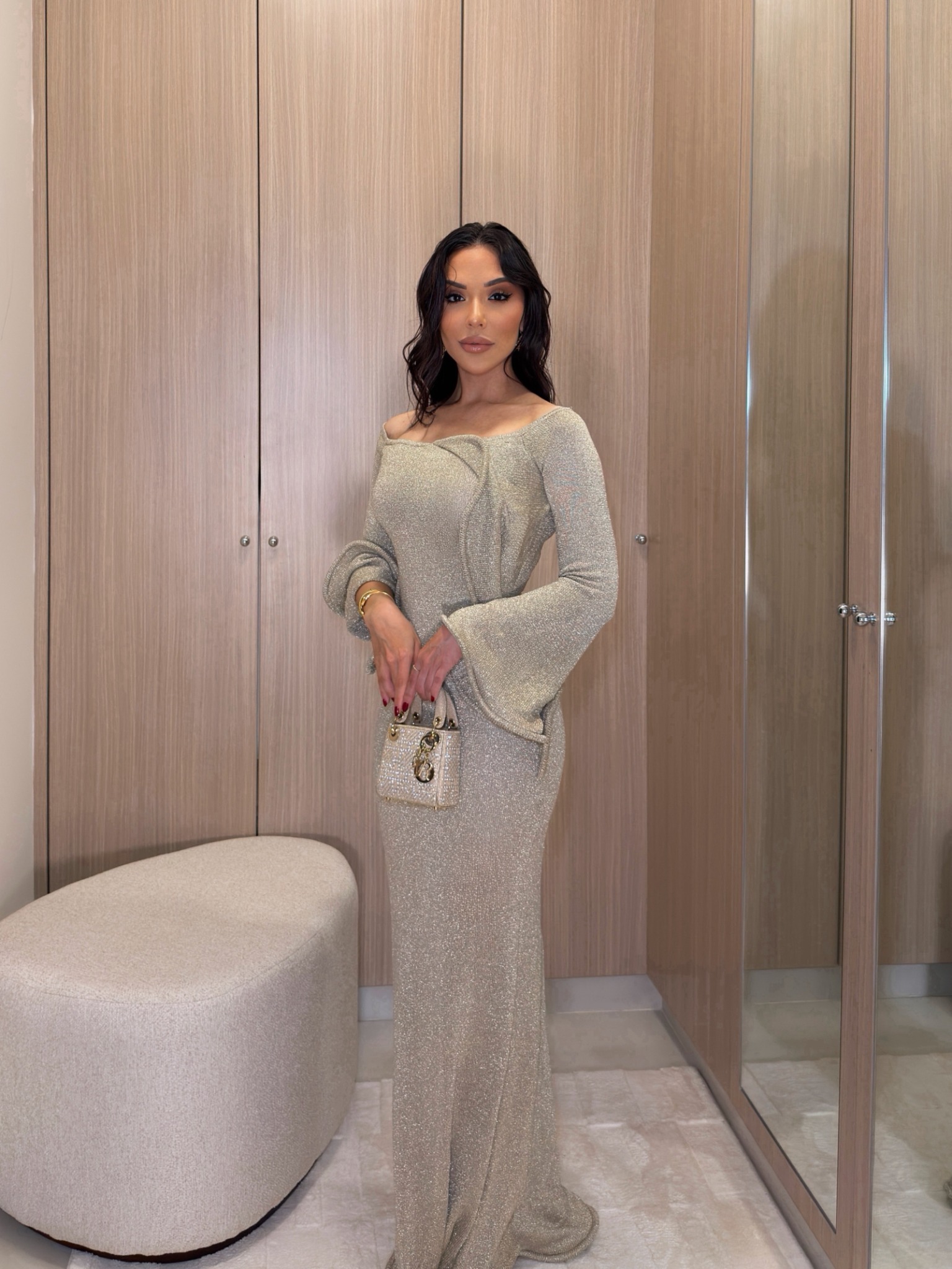 Organic fashion collaboration featuring a silver evening look